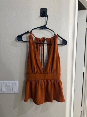 Rust Sleeveless V-Neck Peplum Top